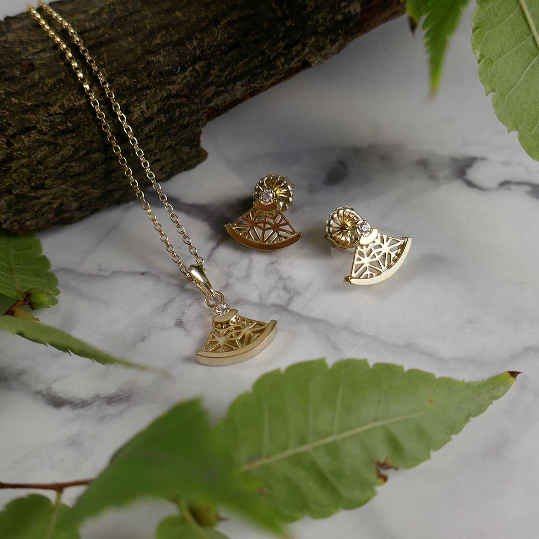 matching necklace and earrings gold and diamonds