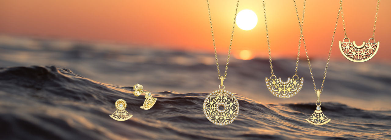 Solar disc jewelry collection in gold and diamonds