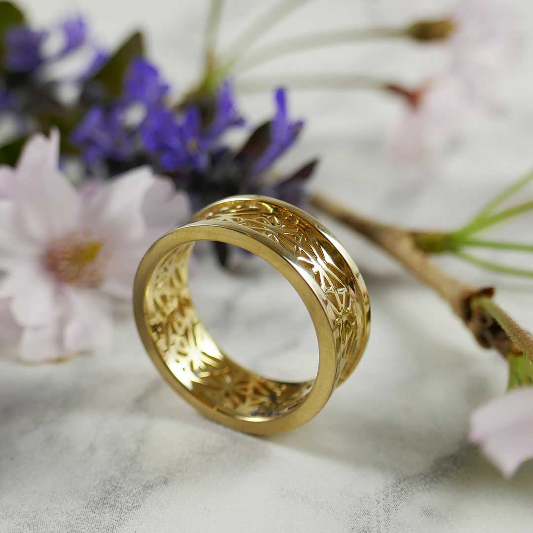 gold ring with primitive design